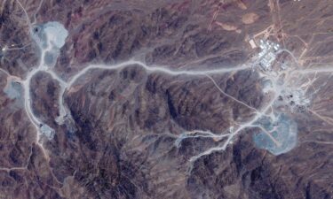 A satellite view shows tunnel entrances at Pickaxe Mountain near Natanz