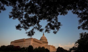 Sunlight falls on the US Capitol as the sun sets in Washington