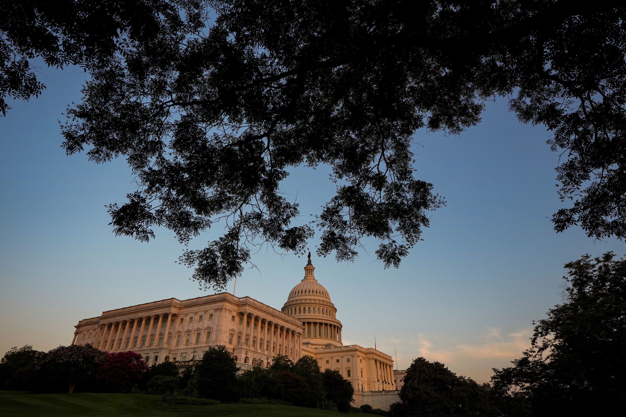 <i>Al Drago/Reuters via CNN Newsource</i><br/>Sunlight falls on the US Capitol as the sun sets in Washington