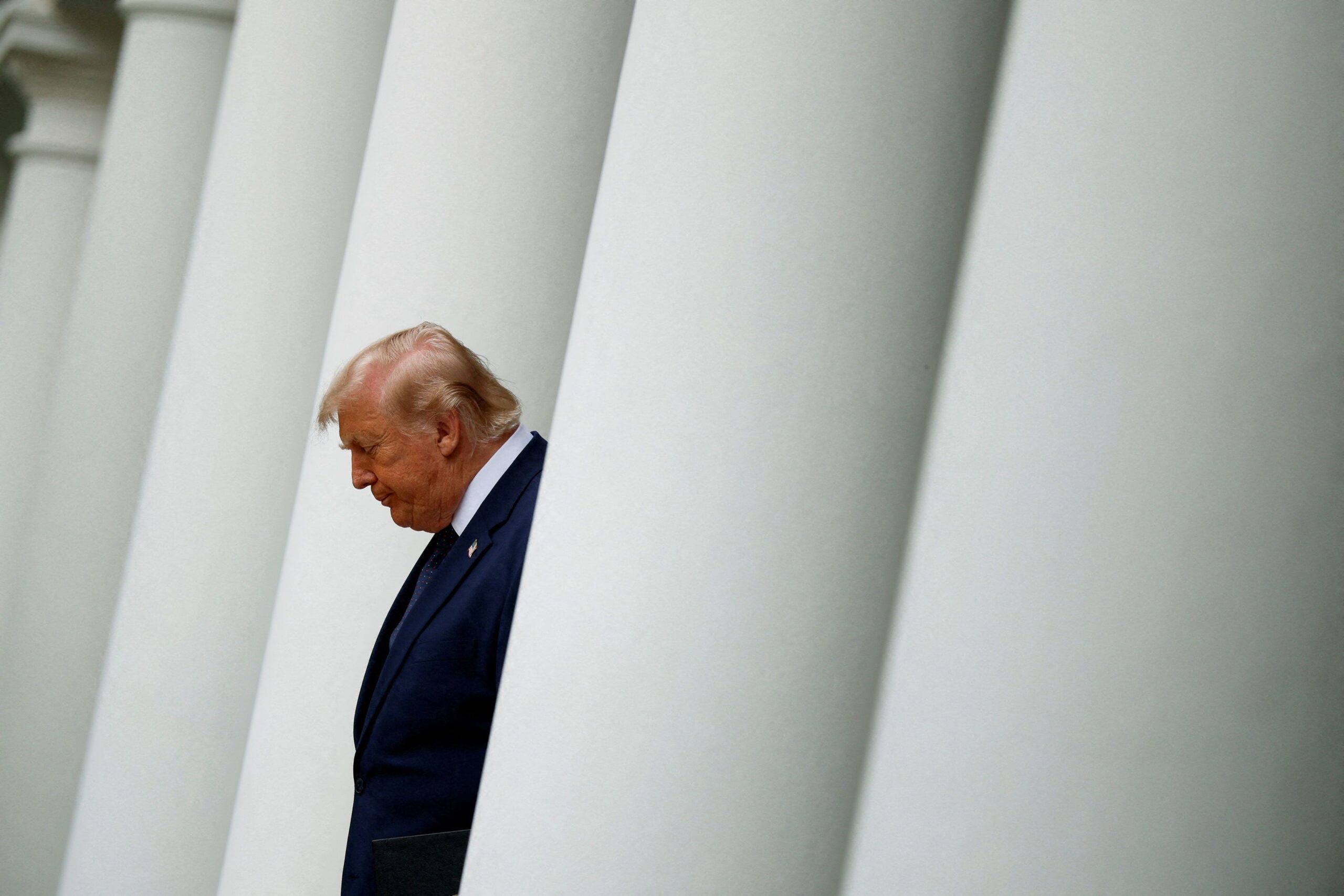 <i>Evan Vucci/Reuters via CNN Newsource</i><br/>President Donald Trump arrives for a Rose Garden Club Lunch at the White House in Washington