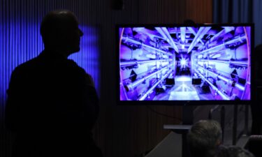 Guests await the beginning of a news conference with then-Energy Secretary Jennifer Granholm at the Department of Energy headquarters to announce a breakthrough in fusion research on December 13