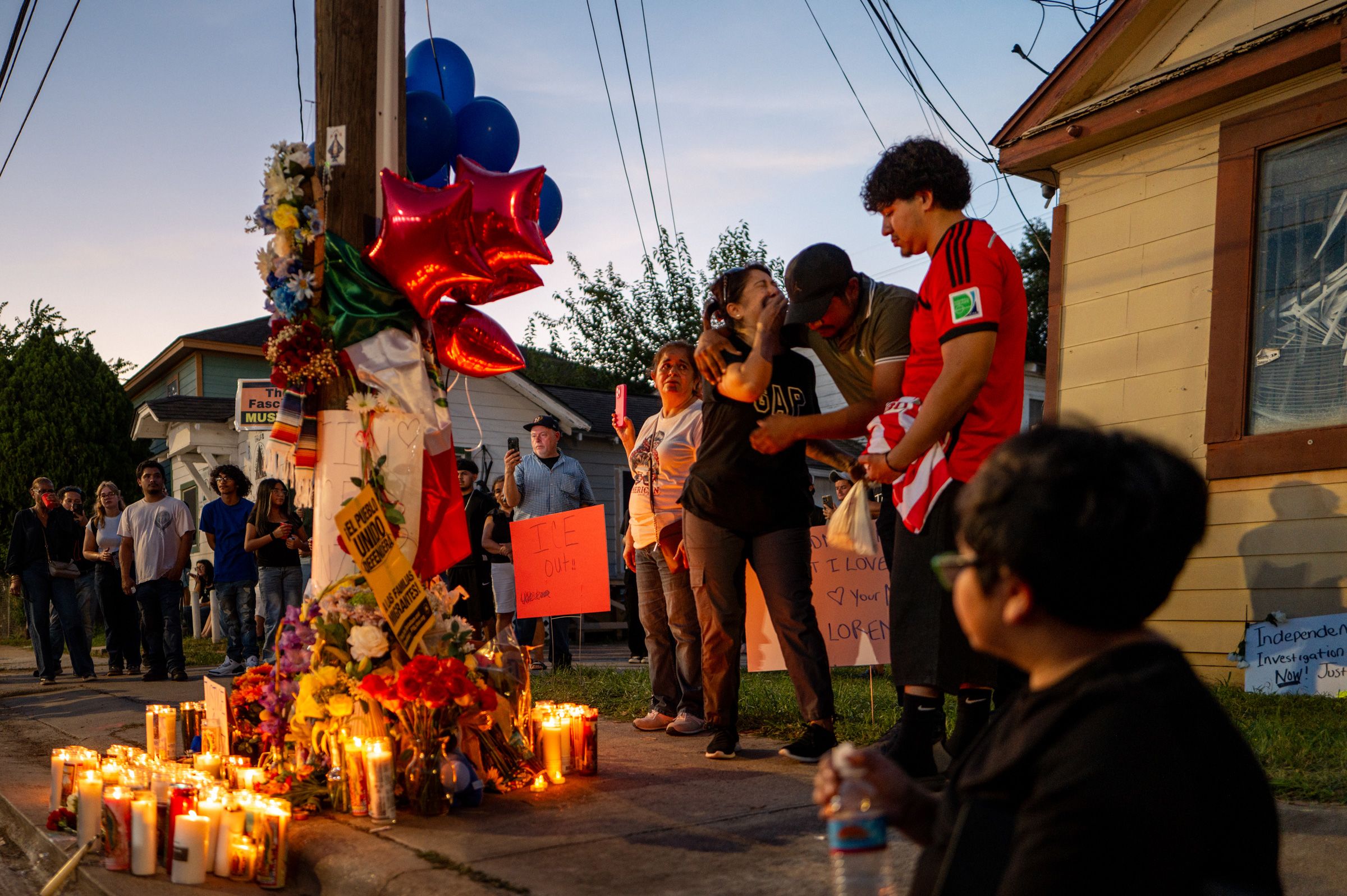 <i>Brandon Bell/Getty Images via CNN Newsource</i><br/>Family members of Lorenzo Salgado Araujo grieve at a makeshift memorial during a candlelight vigil on July 8 in Houston