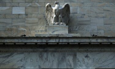The eagle statue sits on the Marriner S. Eccles building of the Federal Reserve Board on August 6