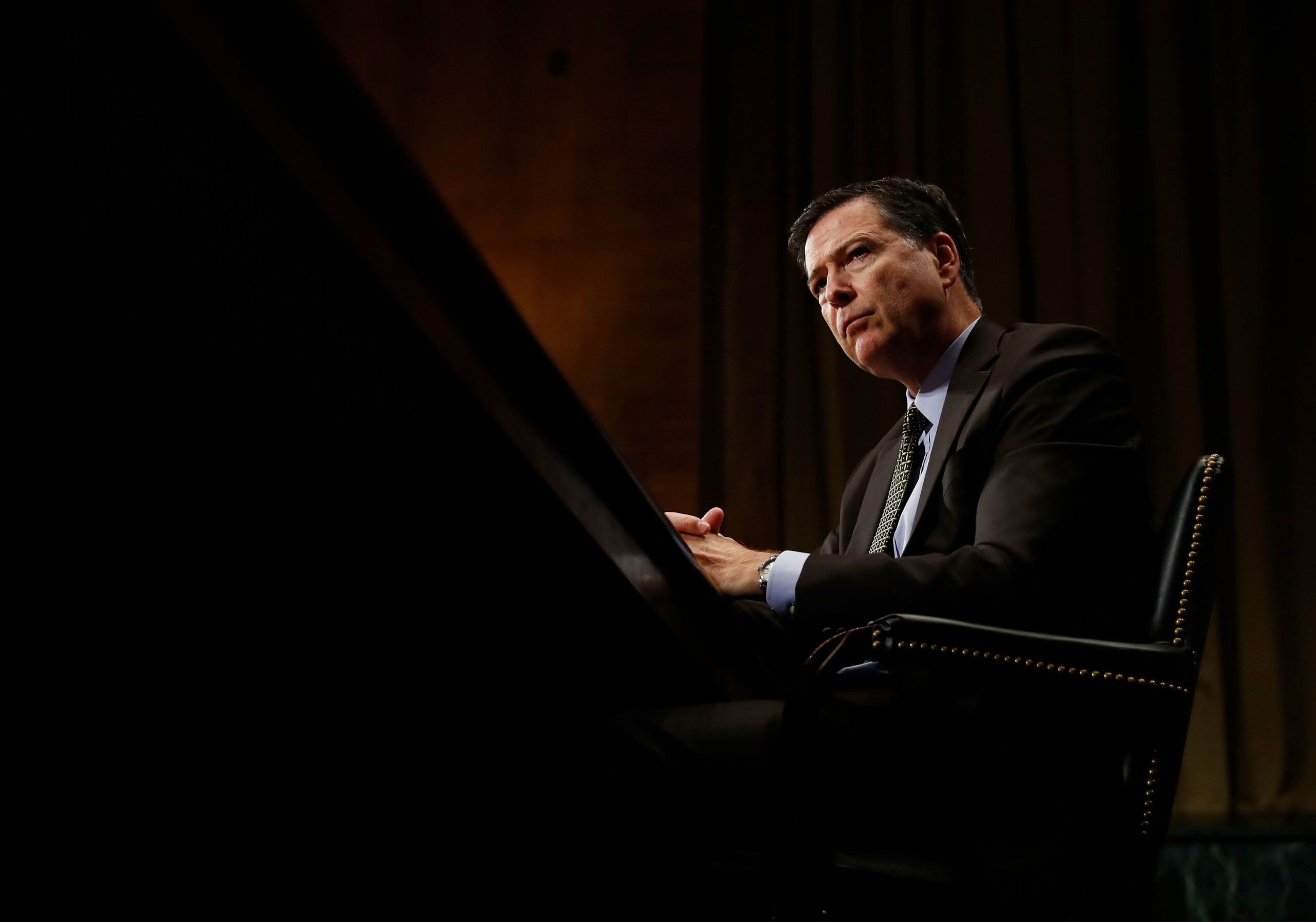 <i>Carolyn Kaster/AP/File via CNN Newsource</i><br/>FBI Director James Comey pauses as he testifies on Capitol Hill in Washington