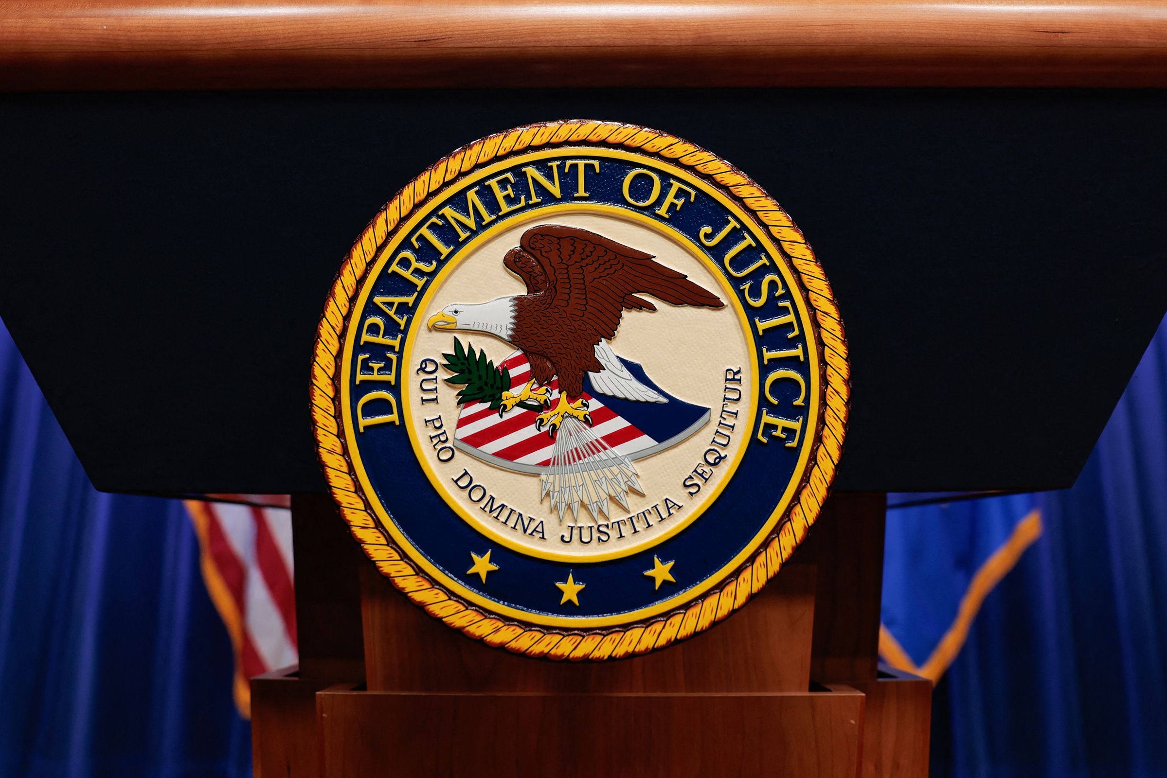 <i>Kent Nishimura/AFP/Getty Images/File via CNN Newsource</i><br/>The seal of the US Department of Justice is displayed on a podium at the Department of Justice headquarters in Washington