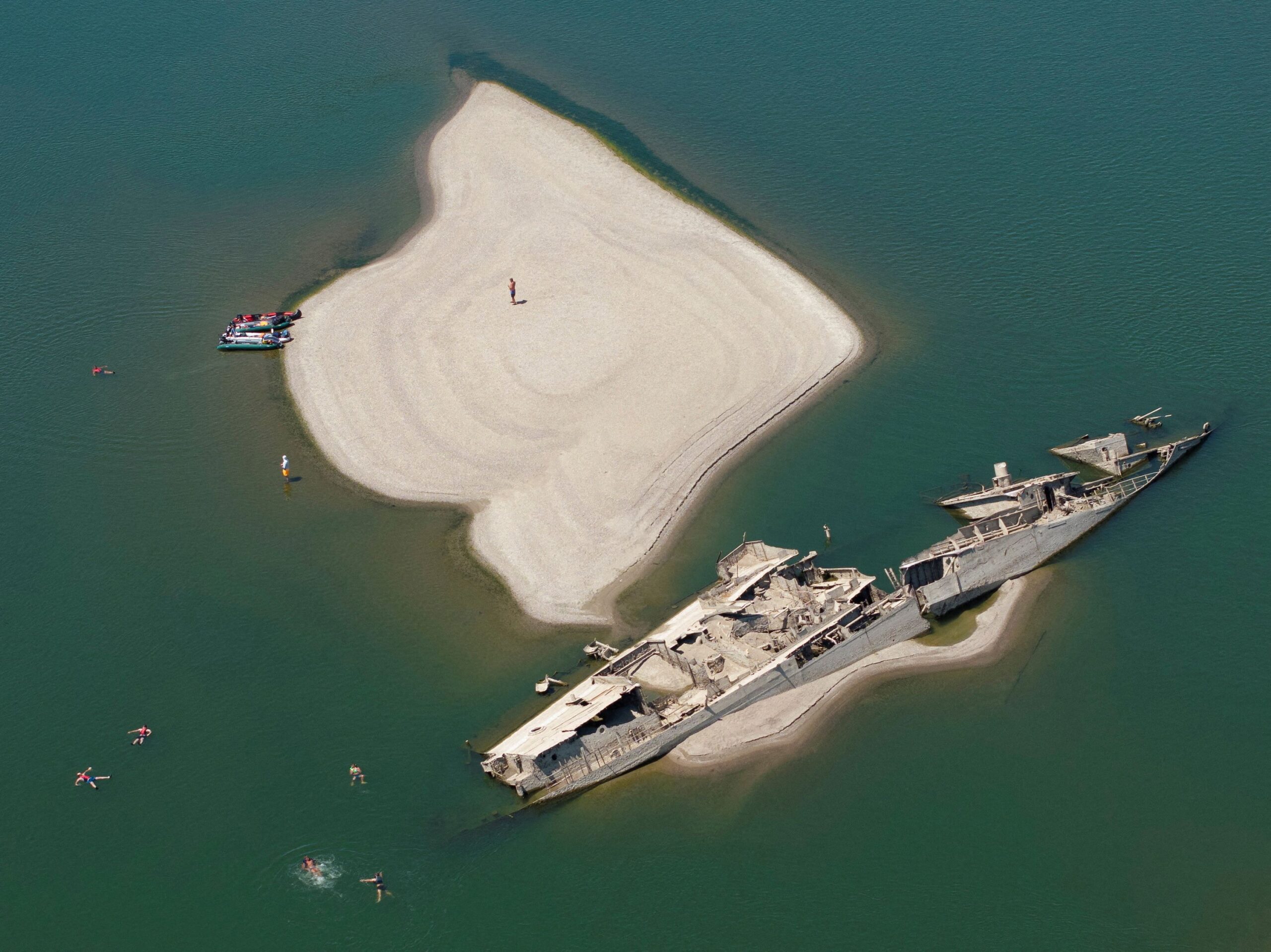 <i>Fabrice Coffrini/AFP/Getty Images via CNN Newsource</i><br/>The parched bed of Brenets Lake