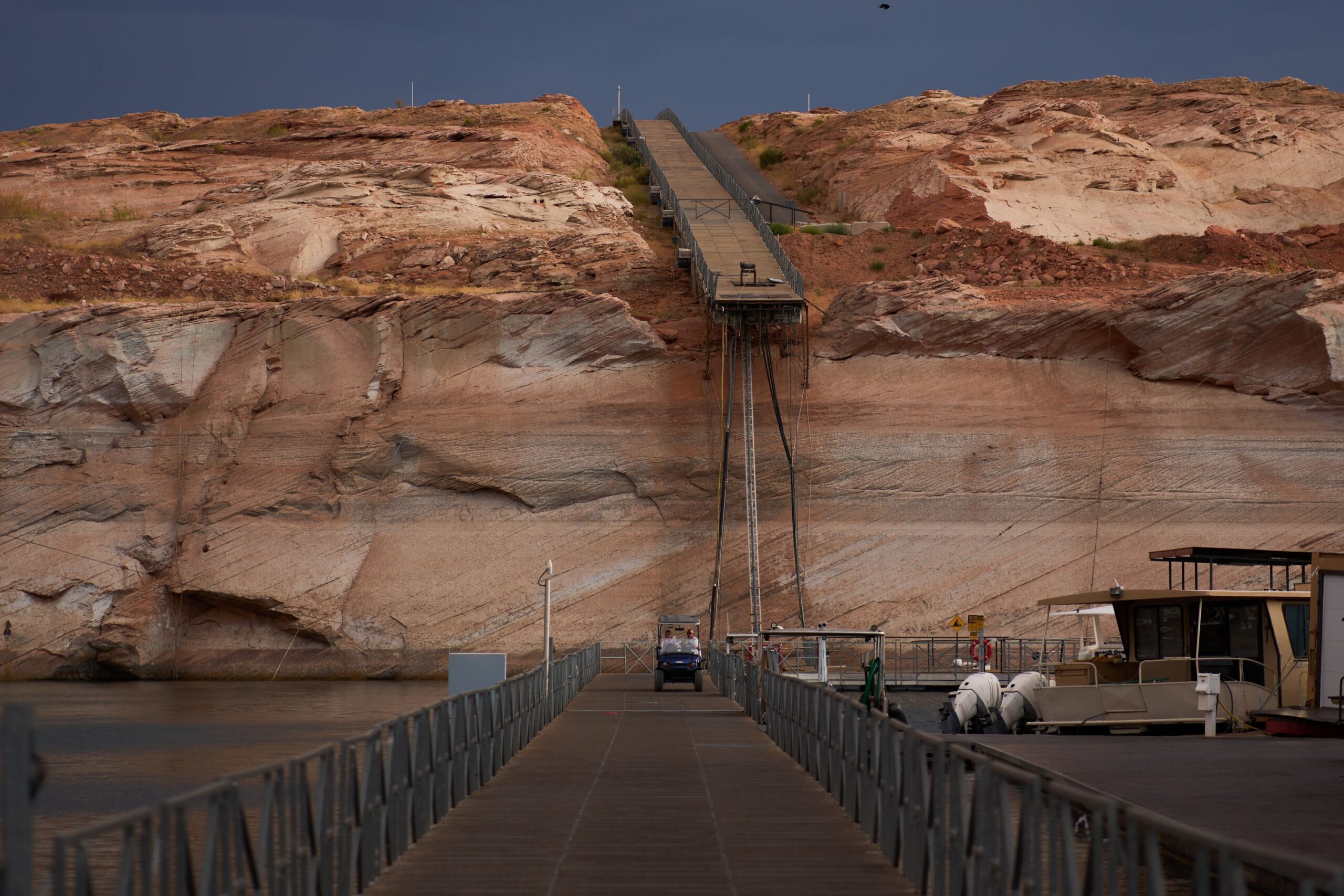 <i>John Locher/AP via CNN Newsource</i><br/>A person stands at an overlook near Lake Powell's Wahweap Marina on July 14.