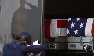 A door marshaller closes the door as the transfer cases containing the remains of U.S. Army 1st Lt Tyler Feehan and U.S. Army Staff Sgt. Michael Emmanuel Swinton arrive at Dover Air Force Base during a dignified transfer for military casualties of the war with Iran on July 22.