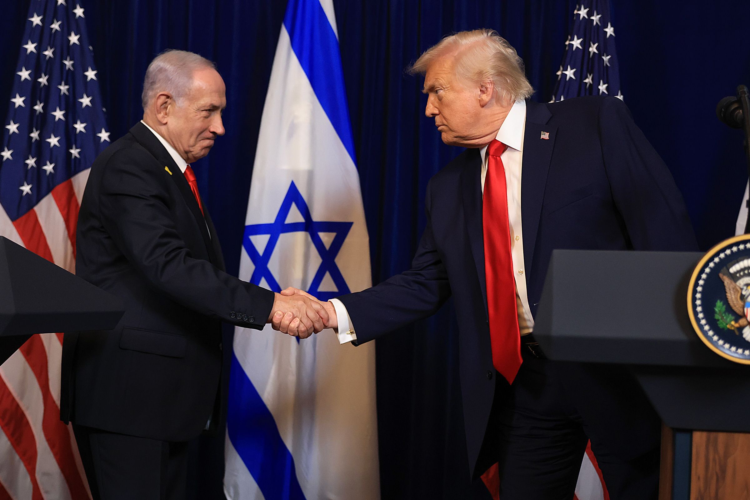 <i>Joe Raedle/Getty Images via CNN Newsource</i><br/>Israeli Prime Minister Benjamin Netanyahu with US President Donald Trump at Trump's Mar-a-Lago club on December 29