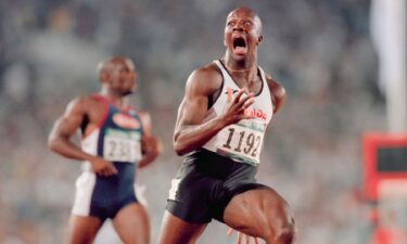 A shocked Donovan Bailey reacts after winning the men's 100m at the 1996 Atlanta Summer Olympics.