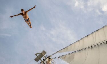 Divers compete at the 2026 World Aquatics High Diving World Cup stop at Porto Flavia in Italy.