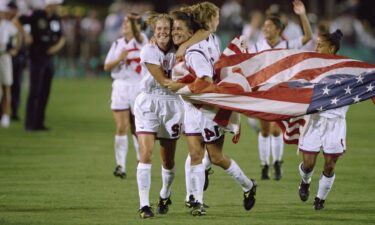 The U.S. women's soccer team celebrates winning gold at the 1996 Atlanta Summer Olympics.