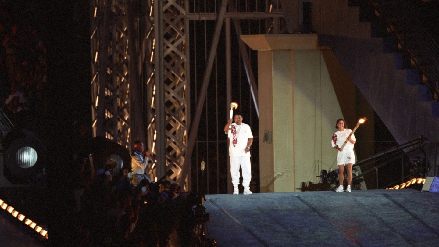 <i>NBC Olympics</i><br/>Muhammad Ali lights the Olympic cauldron during the Opening Ceremony of the 1996 Atlanta Summer Olympics.