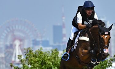 Phillip Dutton of the United States competes with his horse Z during the cross country event of equestrian at Tokyo 2020 Olympic Games