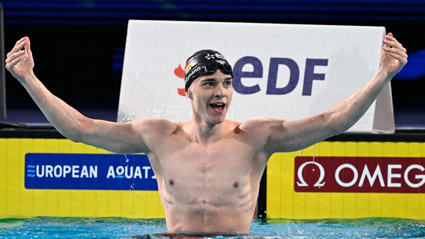 Germany's Johannes Liebmann celebrates after winning and breaking the World record in the  final of the men's 1500m freestyle swimming event during the LEN European Aquatics Championships at the Olympic Aquatic Centre in Saint-Denis