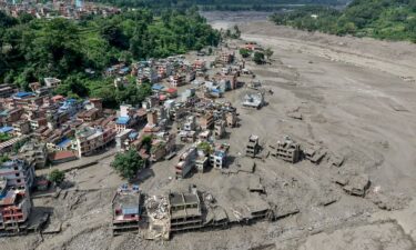 Catastrophic flash flooding has hit China and Nepal.