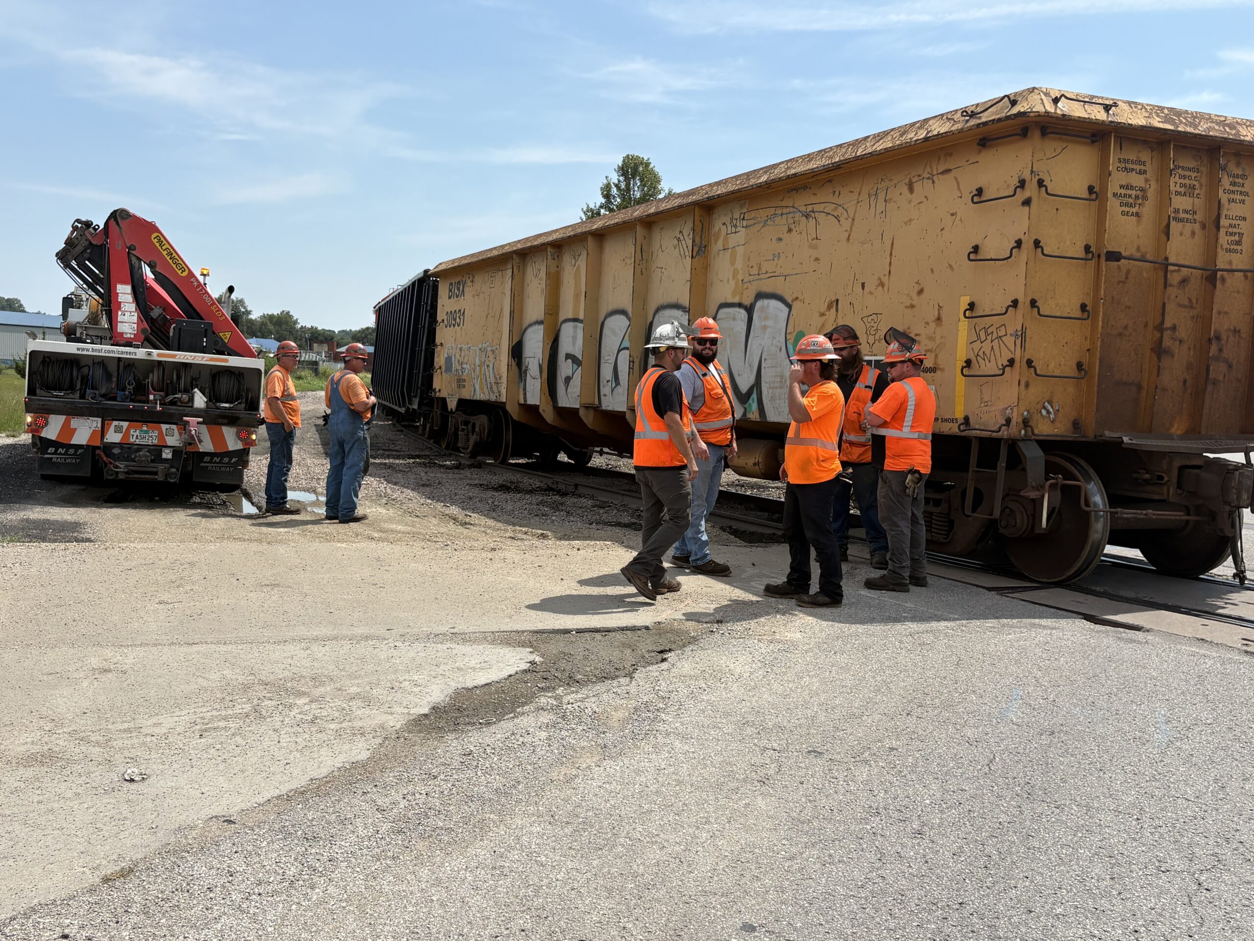 A train derailed off its tracks at South 6th and Seneca streets Friday.