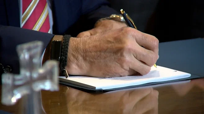 Governor Mike Kehoe signs House Bill 1908 on April 7, 2026.
