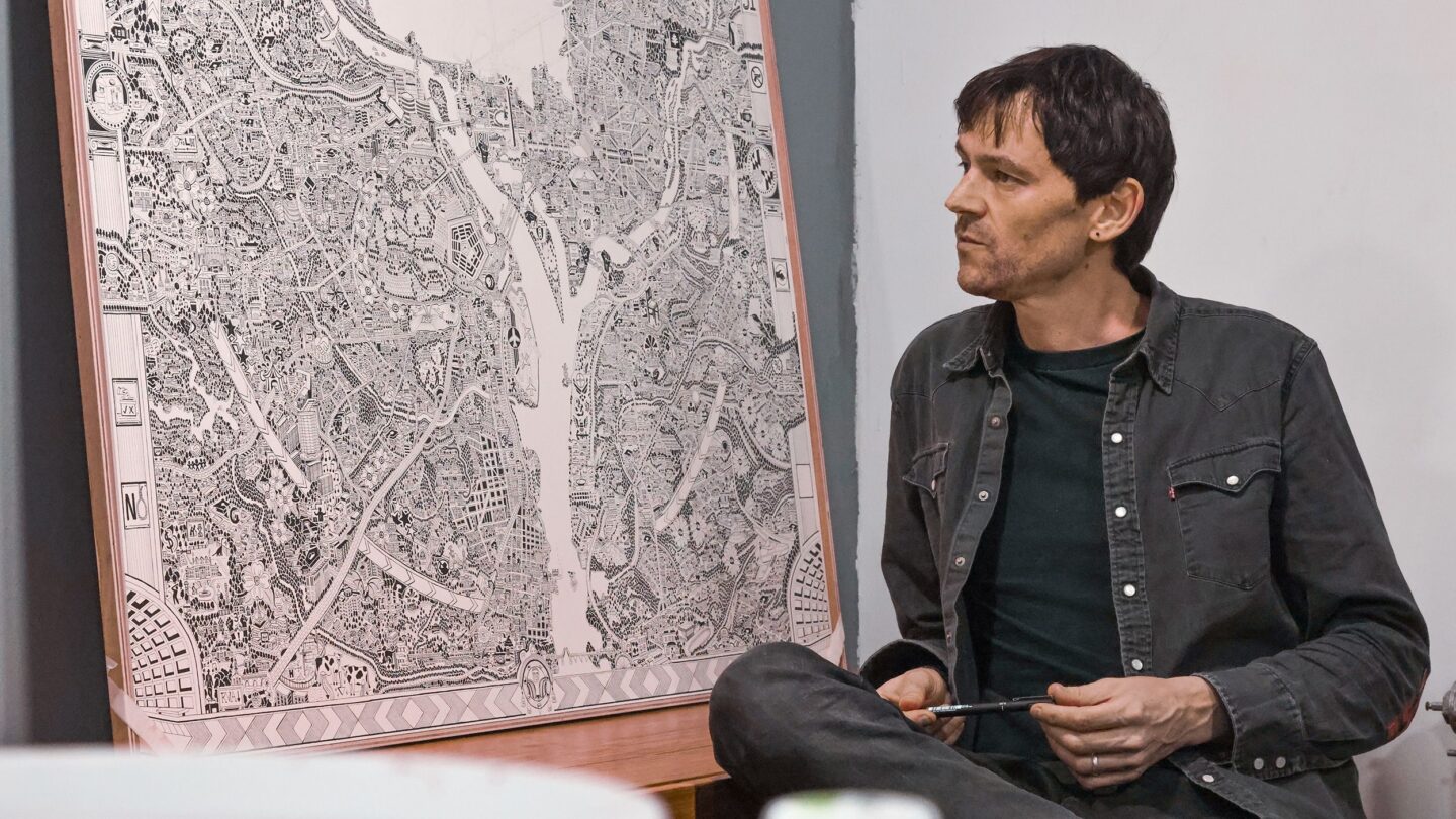 <i>CNN via CNN Newsource</i><br/>Gareth Fuller sits in front of his DC work-in-progress.