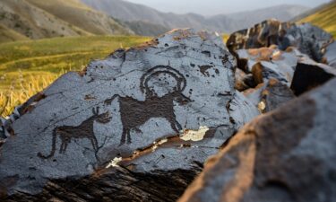 The carvings depict scenes of hunting