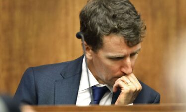 Patrick Clancy testifies during the triple-murder trial of his ex-wife