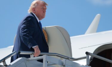 Rep. Russell Fry speaks ahead of a rally with Donald Trump in February 2024.