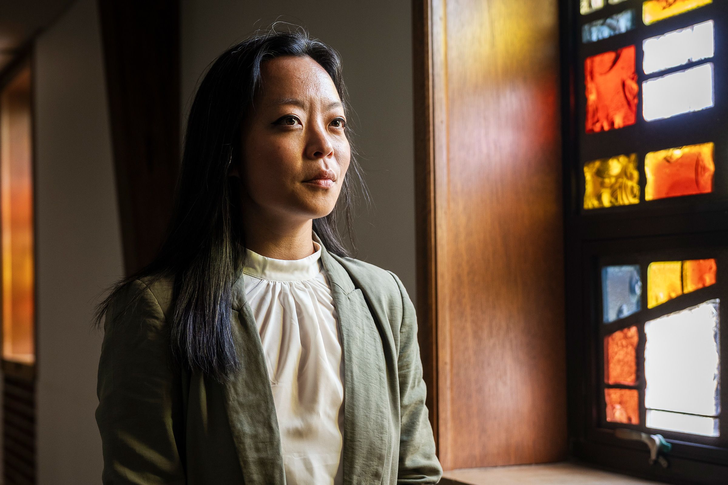 <i>Nam Y. Huh/AP via CNN Newsource</i><br/>Francesca Hong talks with Metcalfe Park Communications Representative Nateya Taylor
