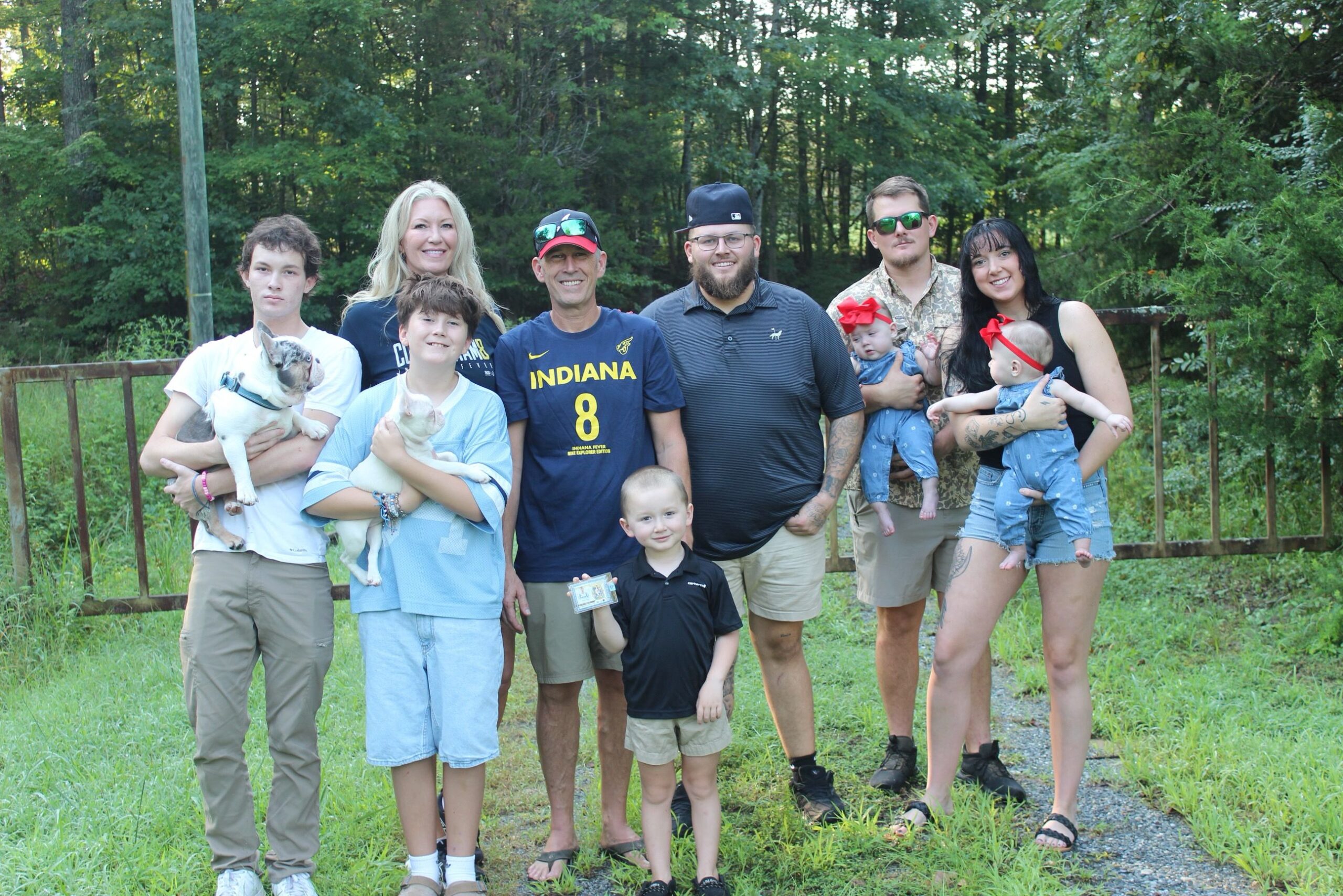 <i>Courtesy Parker J. Asel via CNN Newsource</i><br/>Jason Williams (fourth from left) with his family in Clover