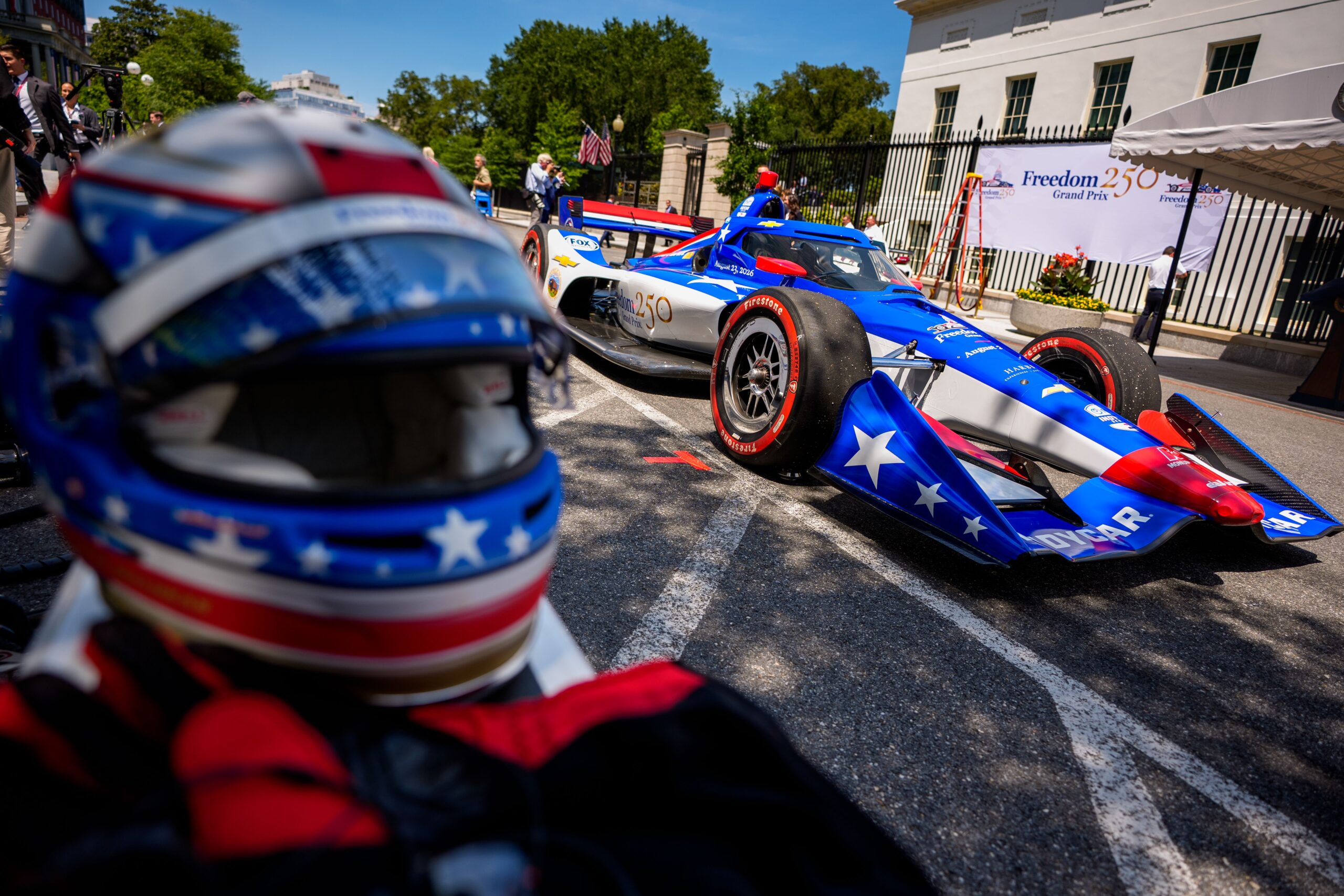 <i>Kylie Cooper/Reuters via CNN Newsource</i><br/>Grand Prix crew members work during a showcase at the White House on July 13.