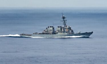 Arleigh Burke-class guided missile destroyer USS Benfold conducts routine operations while underway in the South China Sea July 23