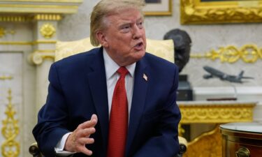 President Donald Trump speaks as he meets with lifeguard Ryder Williams in the Oval Office of the White House