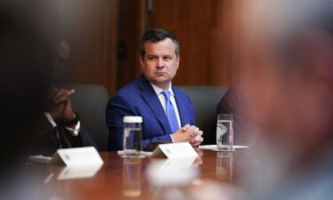 Outgoing Acting Director of National Intelligence Bill Pulte looks on as US President Donald Trump speaks during a Cabinet meeting at Camp David in Maryland
