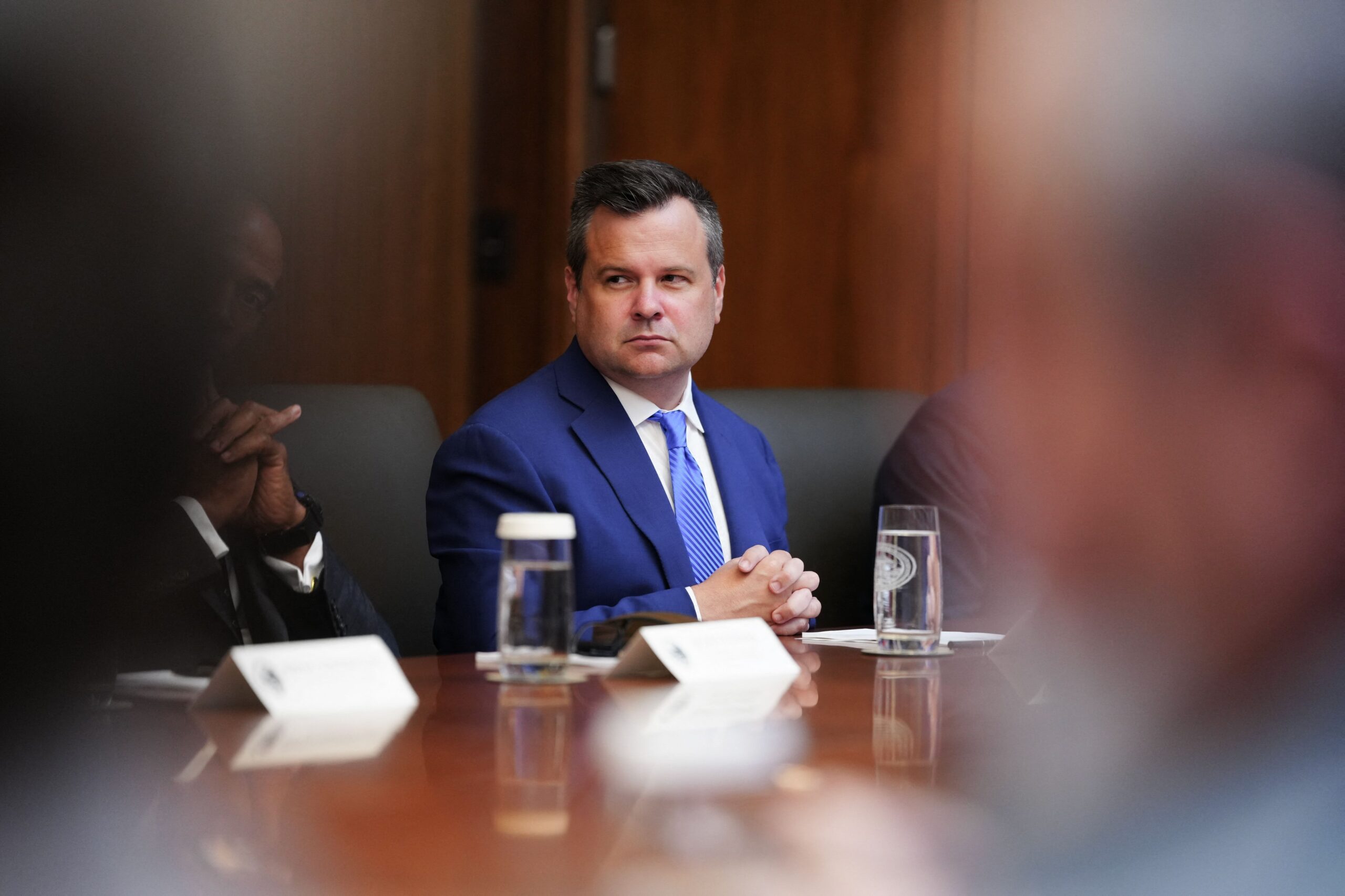 <i>Aaron Schwartz/AFP/Getty Images via CNN Newsource</i><br/>Outgoing Acting Director of National Intelligence Bill Pulte looks on as US President Donald Trump speaks during a Cabinet meeting at Camp David in Maryland