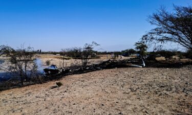 Authorities work where a small aircraft carrying tourists from Germany