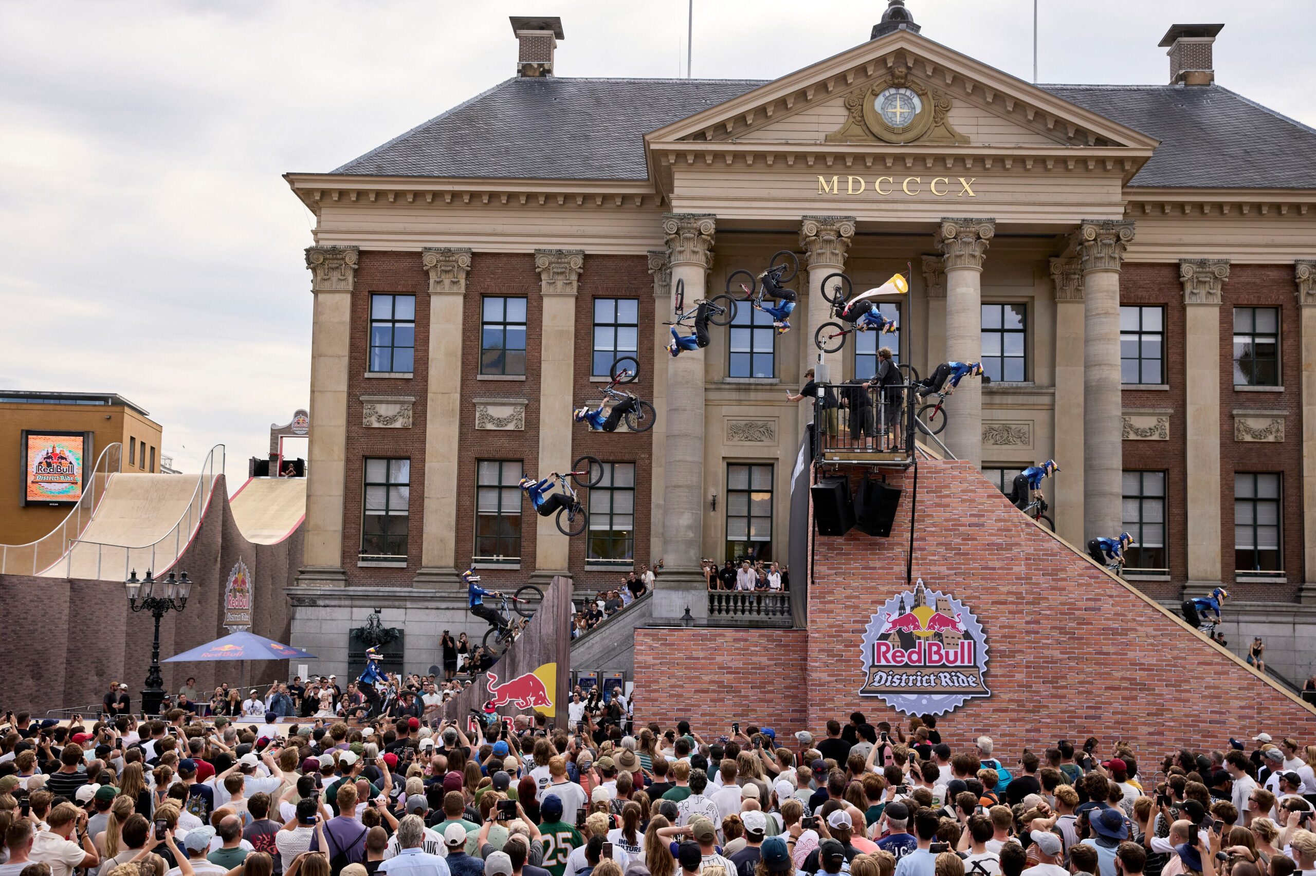<i>Jason Broderick/Red Bull Content Pool via CNN Newsource</i><br/>Dawid Godziek navigates the winding stairs to start his run off the rooftop.