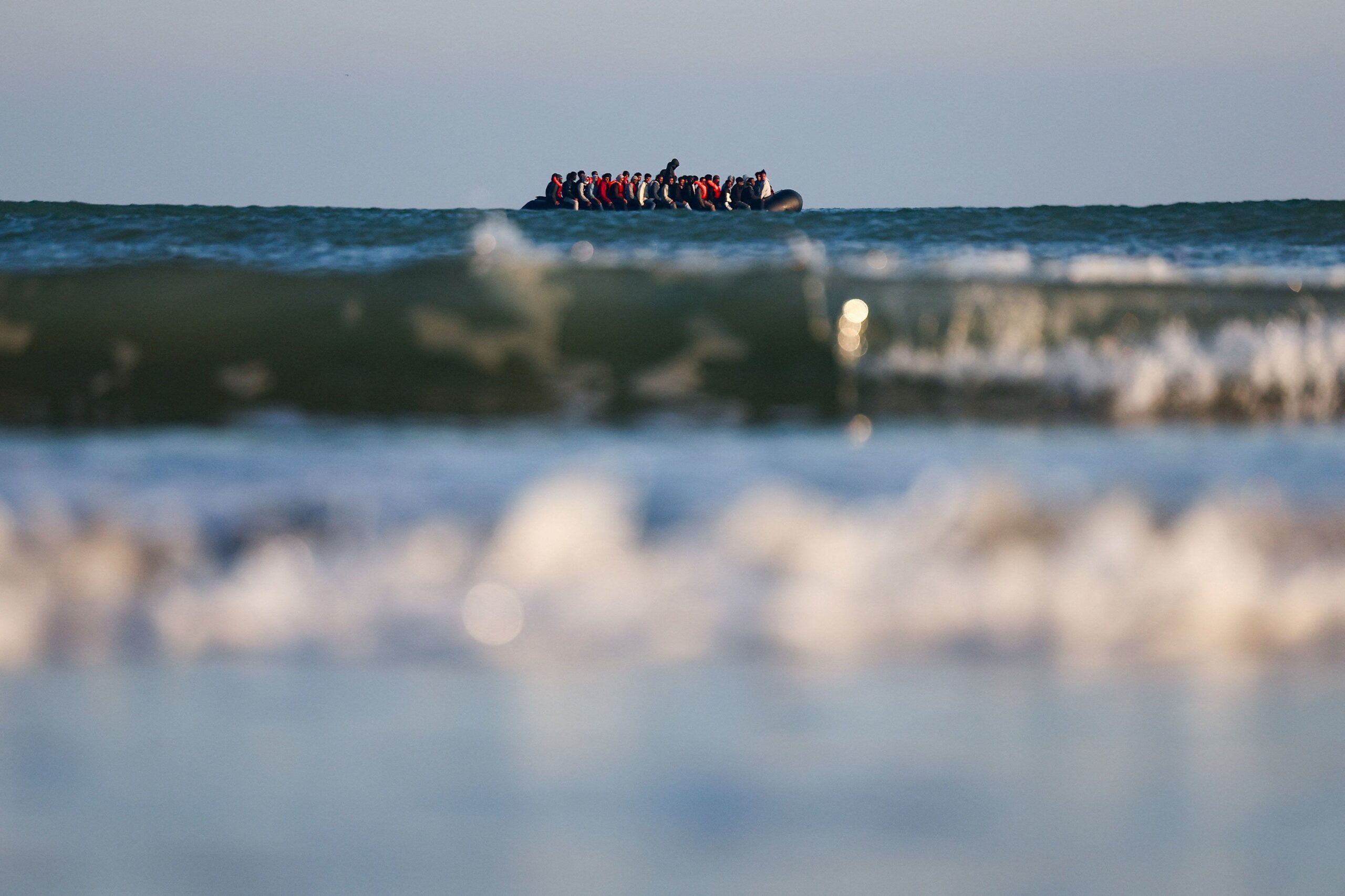<i>Abdul Saboor/Reuters/File via CNN Newsource</i><br/>Migrants on an inflatable dinghy leave the coast of northern France in an attempt to cross the English Channel to reach Britain
