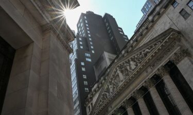 An exterior view shows the New York Stock Exchange (NYSE) on July 24. The Dow on Monday closed above 53