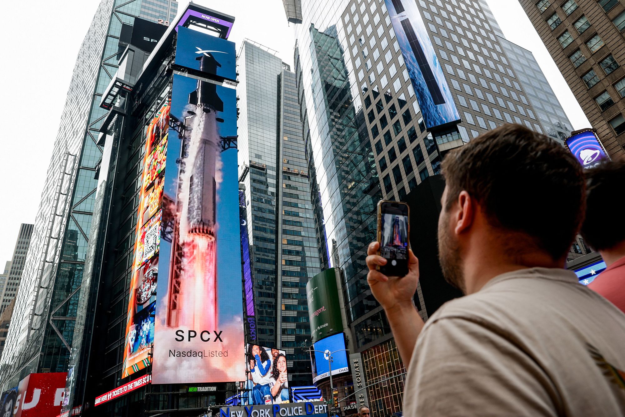 <i>Jeenah Moon/Reuters via CNN Newsource</i><br/>SpaceX shares soared when the company made its public debut in June. Since then