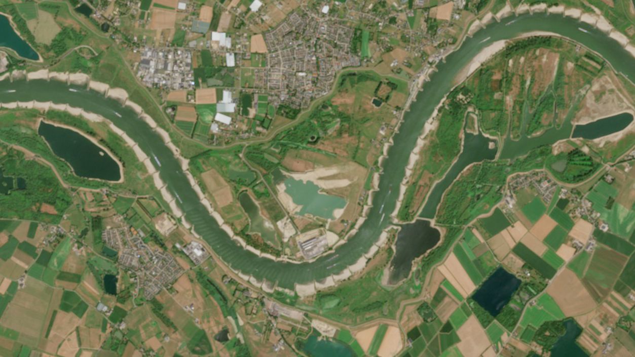<i>Thomas Lohnes/Getty Images via CNN Newsource</i><br/>A cargo ship passes a huge exposed sandbar on the Rhine River during an ongoing drought and heat wave on July 30