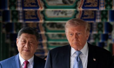 US President Donald Trump walks through Zhongnanhai Garden with Chinese leader Xi Jinping in Beijing