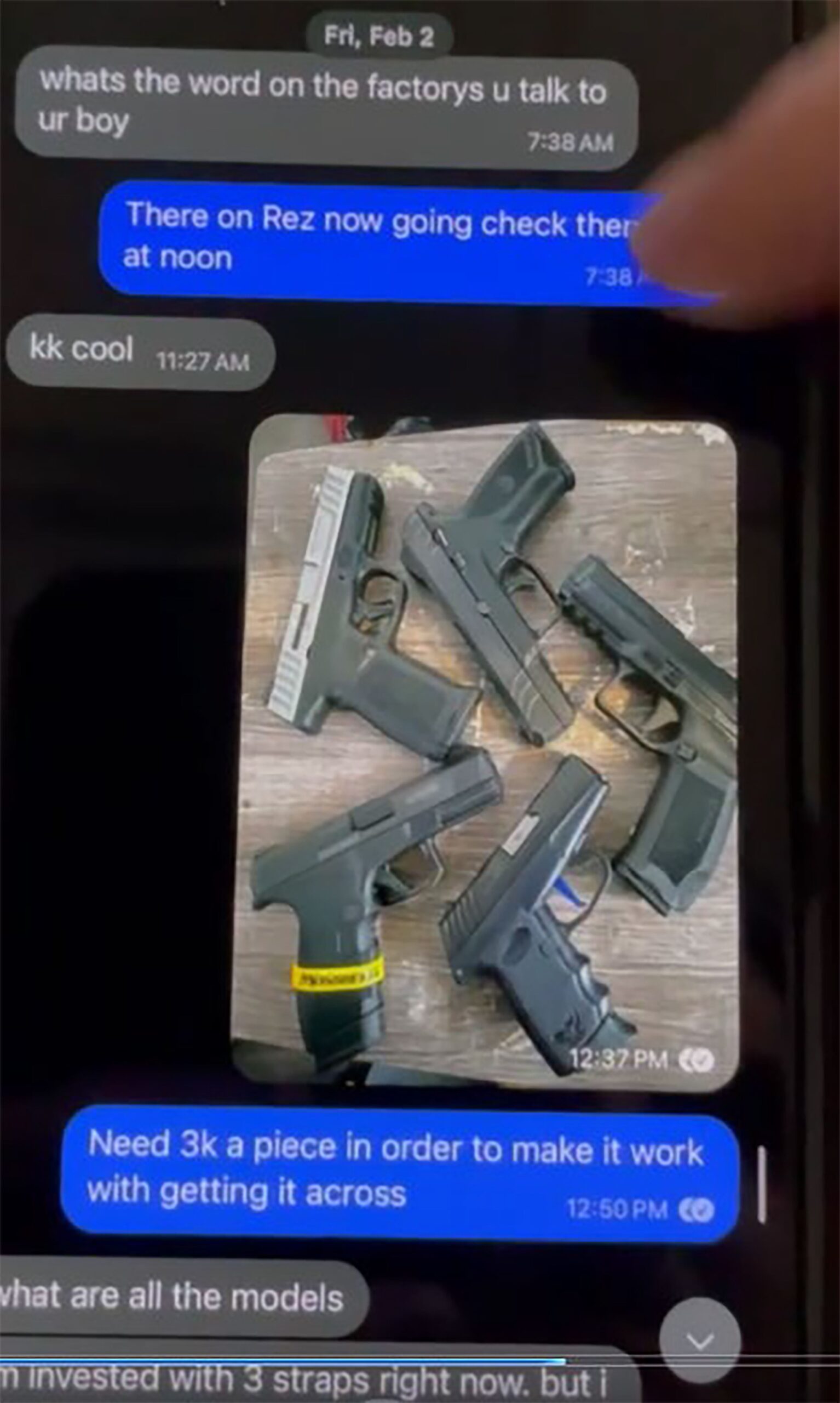 <i>DOJ via CNN Newsource</i><br/>This image of five guns was taken from one of the defendant's cell phones