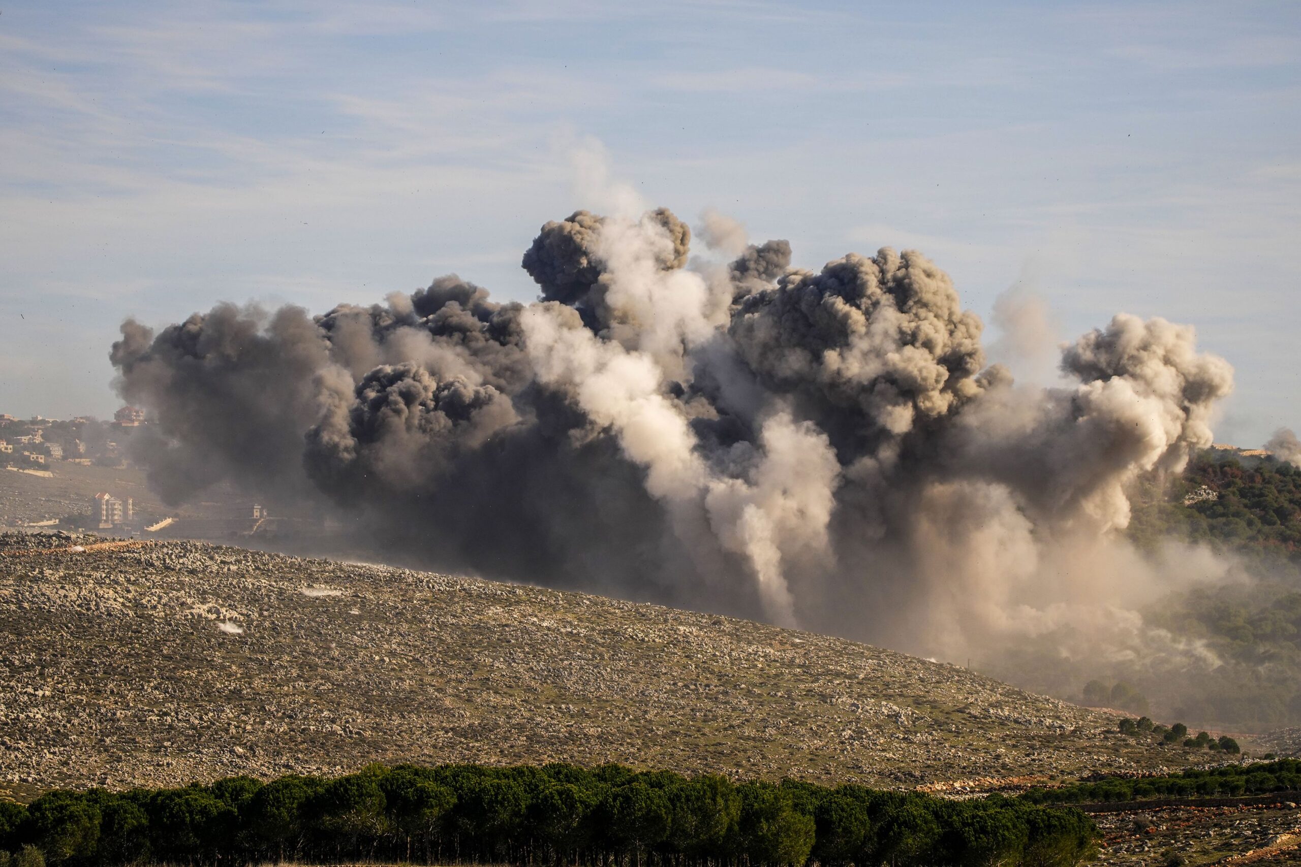 <i>Hassan Ammar/AP/File via CNN Newsource</i><br/>Black smoke rises from an Israeli airstrike on the outskirts of Yaroun