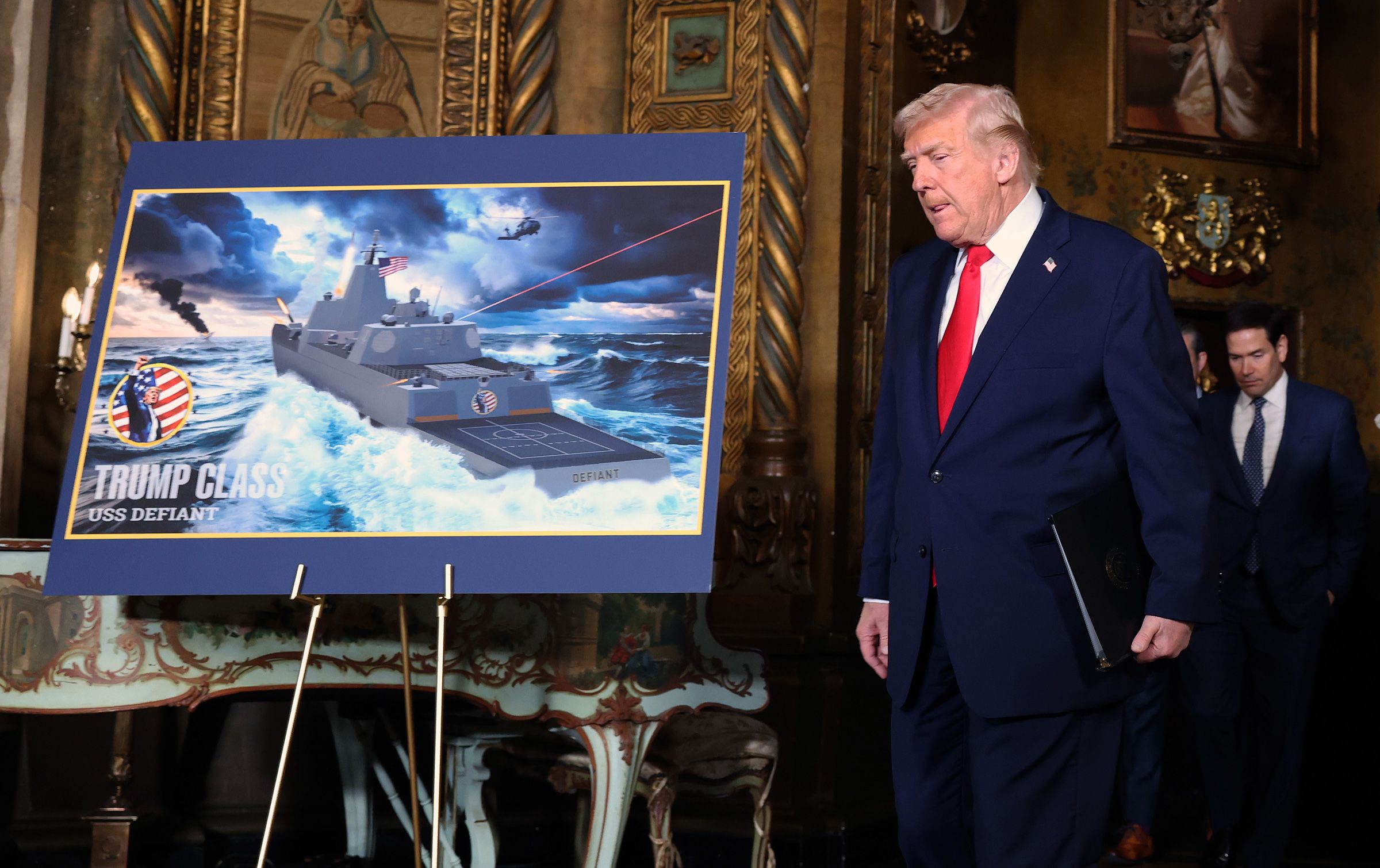 <i>Tasos Katopodis/Getty Images via CNN Newsource</i><br/>President Donald Trump arrives to announce the creation of the “Trump-class” battleship during a statement to the media at Trump’s Mar-a-Lago estate on December 22