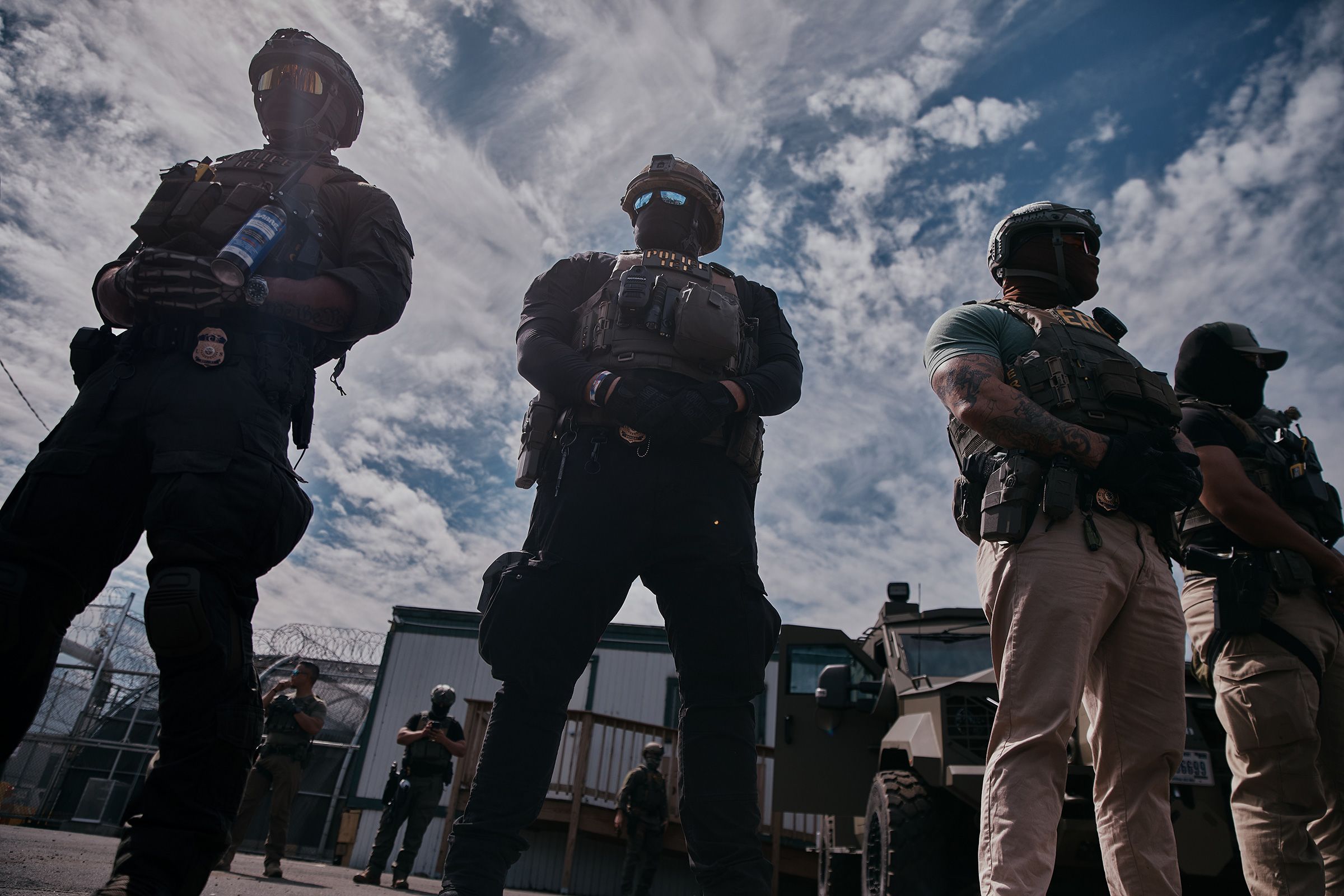 <i>US Immigration and Customs Enf/Reuters via CNN Newsource</i><br/>An agent passes meat being prepared during a raid by US Immigration and Customs Enforcement at a Glenn Valley Foods meat production plant in Omaha