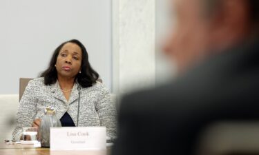 Federal Reserve Board Governor Lisa Cook participates in a board meeting at the Federal Reserve on March 19 in Washington