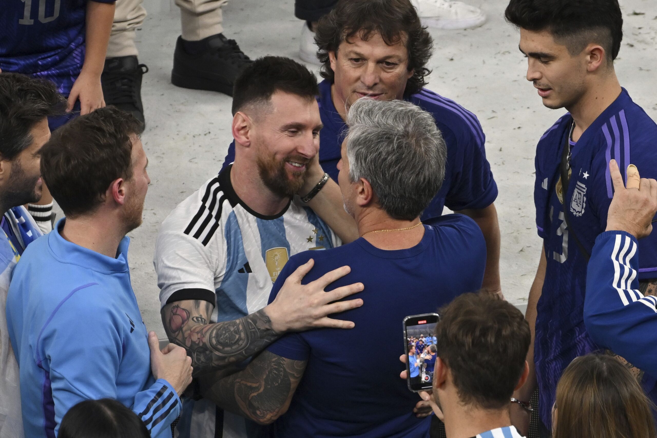 <i>Robert Michael/dpa/picture-alliance/AP via CNN Newsource</i><br/>Argentina's Lionel Messi celebrates with his father Jorge Messi following his team's win during 2022 FIFA World Cup final match against France at Lusail Stadium in Qatar on December 18. 2022.