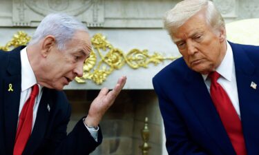 Israeli Prime Minister Benjamin talks to US President Donald Trump during a meeting in the Oval Office of the White House on April 7