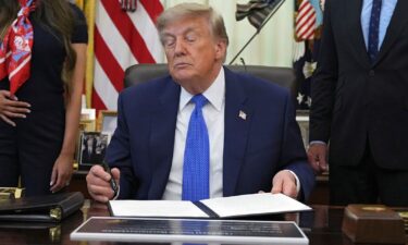 President Donald Trump signed an executive order Monday that seeks to pare down the number of routine immunizations for children.