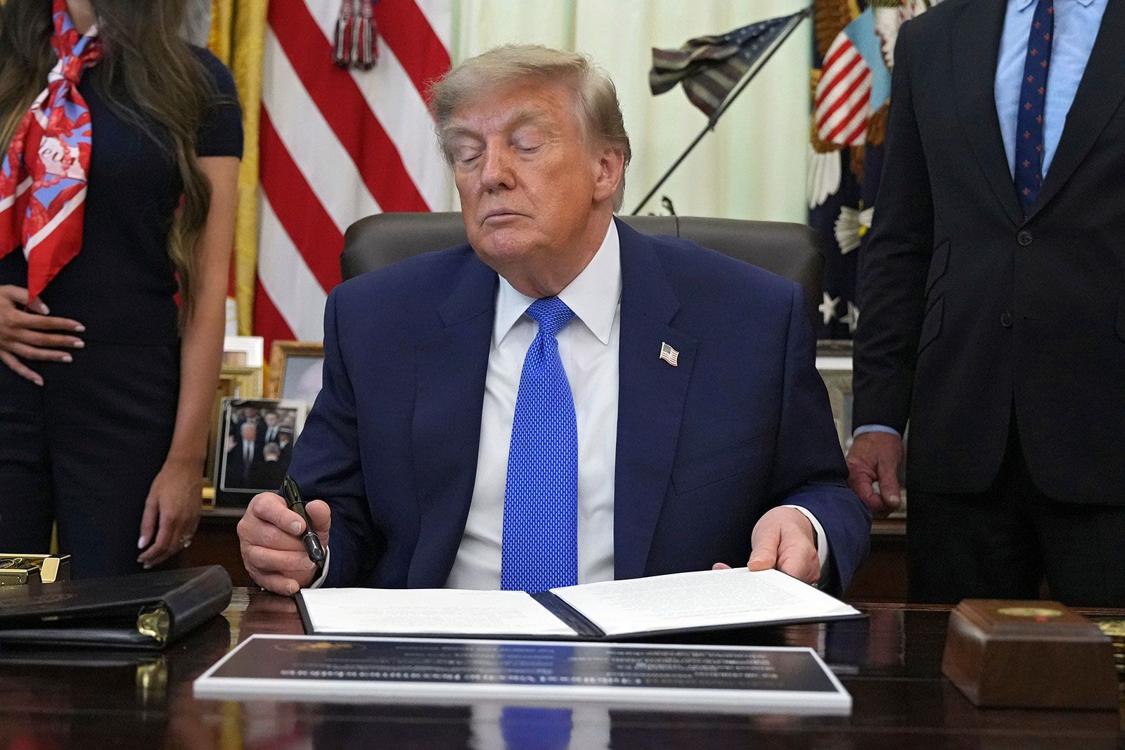<i>Jacquelyn Martin/AP via CNN Newsource</i><br/>President Donald Trump signed an executive order Monday that seeks to pare down the number of routine immunizations for children.
