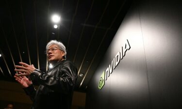 Nvidia CEO Jensen Huang is pictured speaking with the media in Tokyo in July